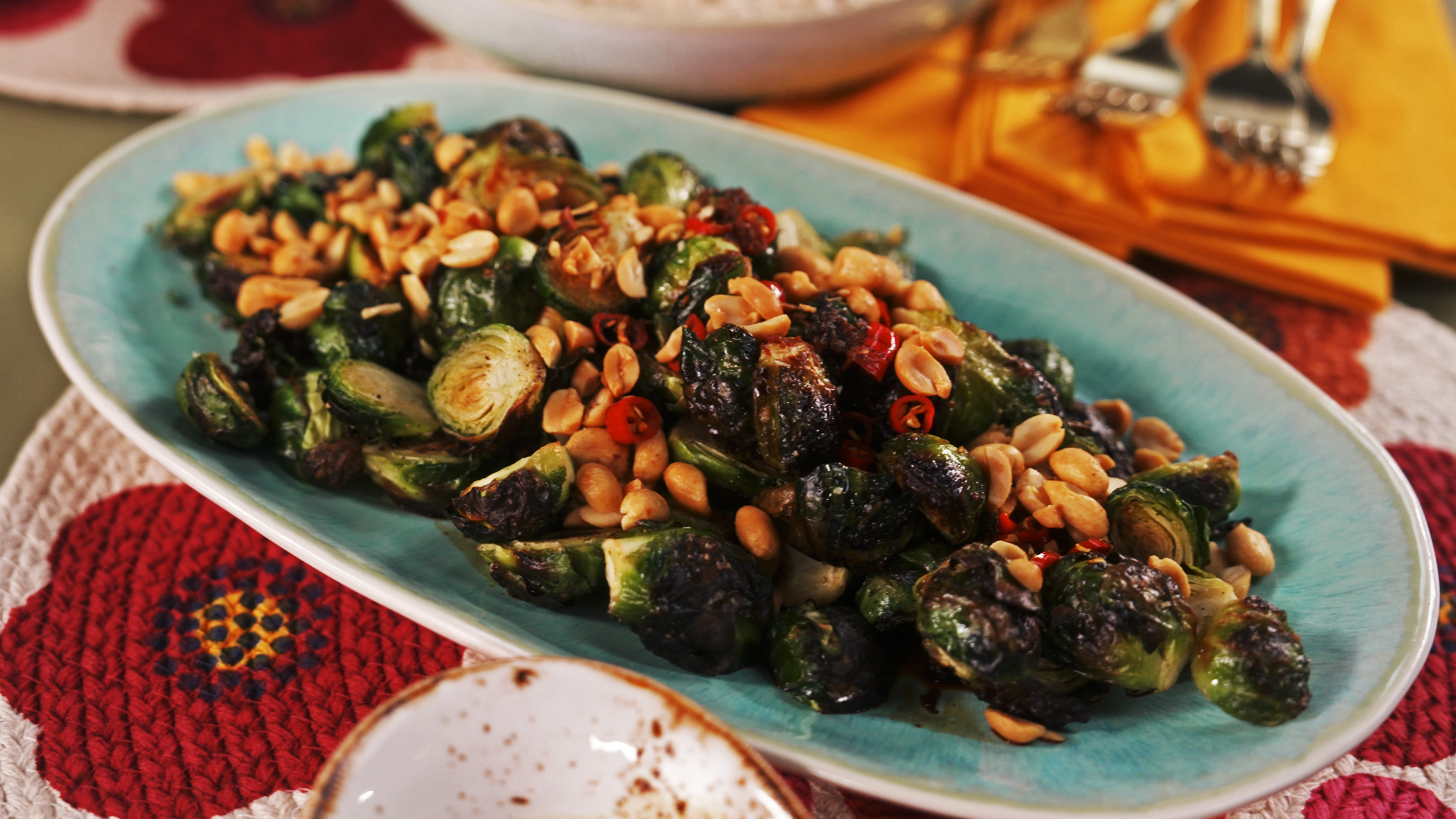 Roasted Brussels Sprouts with Chili Lime Dressing and Peanuts